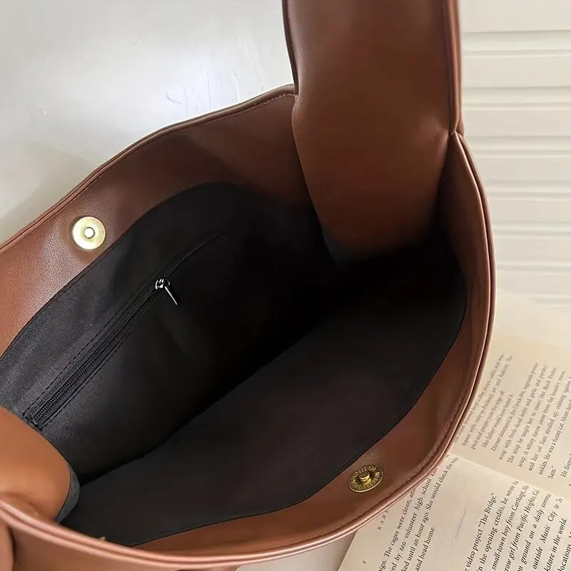 لولي | حقيبة يد جلدية